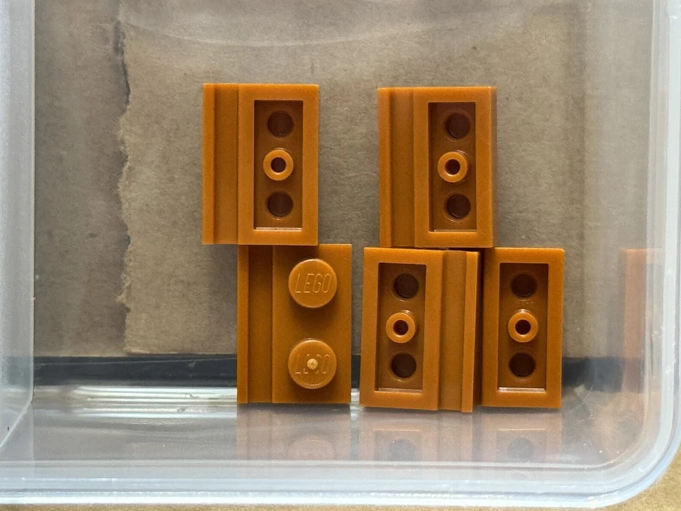Piezas LEGO - Placa Naranja Oscuro, Modificada 1 x 2 con Riel de Puerta - Nº 32028 - CANTIDAD 5 Foto 1 de 1