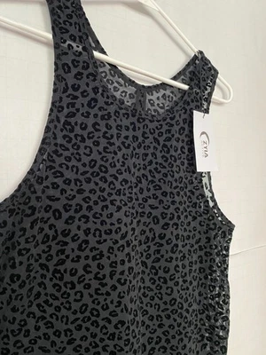 Camiseta sin mangas ZYIA ACTIVE negra de malla de leopardo talla M con abertura trasera Foto 1 de 4