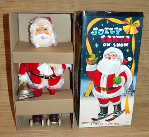 Pattini vintage Jolly Babbo Natale su neve NUOVI NRFB Kitschy Natale Giappone anni '50 # - Foto 1 di 4