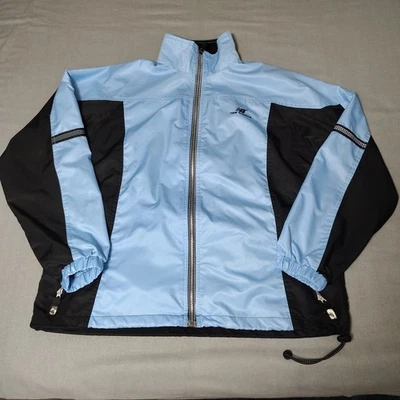 New Balance - Cortavientos Mujer Mediano - Cremallera Completa - Azul/Negro - Ligero Foto 1 de 4