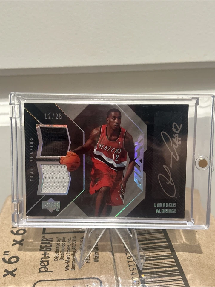 2006-07 Upper Deck Black- Lamarcus Aldridge #ADM-LA Dual Patch Auto 12/25 - Image 1 of 2