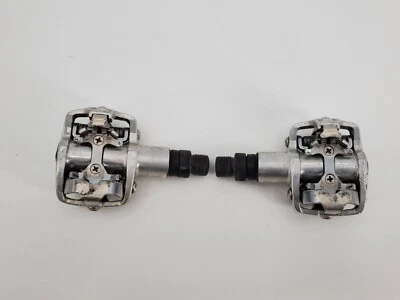 Pedales de bicicleta de montaña GT SPD de colección izquierda y derecha plateados  Foto 1 de 4