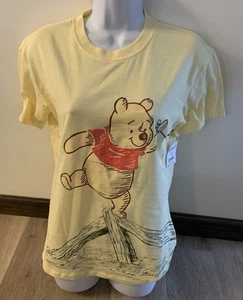 (NWT) Disney Ladies Size XS (0-2) Yellow Winnie The Pooh Top With Eeyore On Back - Picture 1 of 6