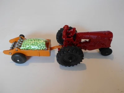 Tractor vintage 1950 SLIK Toys 1:25 Minneapolis Moline Modelo R con esparcidor de estiércol Foto 1 de 4