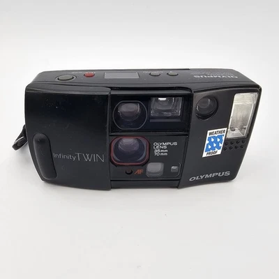 Câmera de Filme Olympus Infinity Lente Gêmea 35mm 70mm Bateria Funcionando À Prova de Intempéries  - Imagem 1 de 4