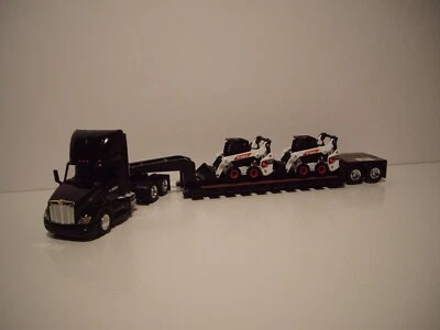 ERTL 1/64 BLACK PETE 579 DAYCAB W/T 2 AXLE LOWBOY&S76 BOBCAT LOAD SAME SCALE DCP - Image 1 of 4