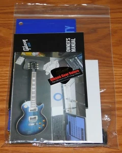 Gibson Les Paul Traditional Case Candy Manual Warranty COA Wrench Guitar Parts - Picture 1 of 8