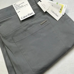 Calvin Klein Herrenhose Größe 34 x 30 schmale Passform grau neu mit Etikett Arbeit Karriere Reise Büro - Bild 1 von 12