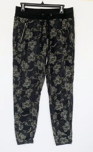 Athleta Damengröße 10 Trekkie North bedruckte Jogginghose olivgrün Blumenmuster Hose - Bild 1 von 5