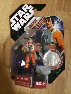 MOC! Figura de acción Star Wars Biggs Darklighter 2007 con moneda de coleccionista Foto 1 de 4