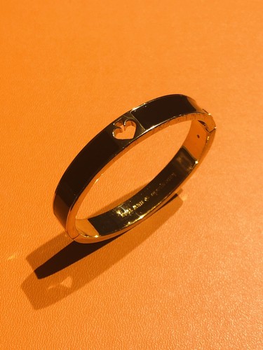 Bracciale Kate Spade New York placcato oro smalto nero