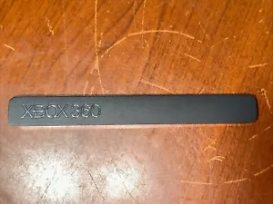 Lunetta di ricambio Microsoft Xbox 360 S nero opaco OEM per vassoio disco - Foto 1 di 8