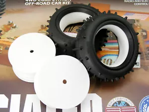 Team Associated #6040 RC10 4x4 ruedas delanteras completas y neumáticos con clavos con inserto de espuma - Imagen 1 de 4