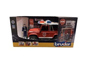 Bruder 62701 bworld Feuerwehrstation mit Land Rover Defender & Feuerwehrmann NEU - Bild 1 von 2