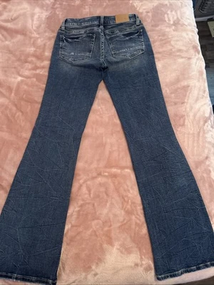Stella Bootcut BKE 女式蓝色牛仔裤 25 码棉质低腰 31.5 内缝 — 第 1/4 张图片