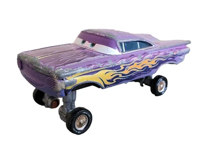 Disney Cars Ramone Hydraulique Violet – Chevrolet Impala Métal 1/55 – Bon état - Photo 1/4