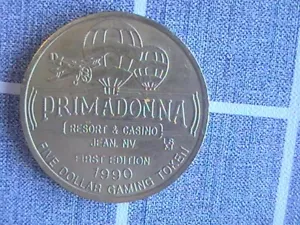CASINO FIVE DOLLAR GAMING TOKEN PRIMADONNA RESORT & CASINO JEAN NV 1ª EDICIÓN 1990 - Imagen 1 de 4