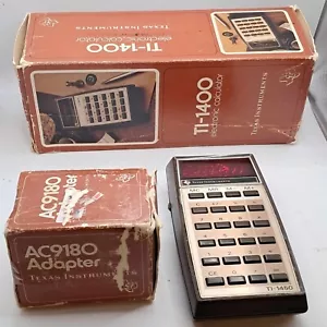 Texas Instruments TI-1400 elektronischer Taschenrechner + Box + Adapter getestet funktioniert - Bild 1 von 19