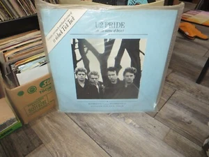 U2 Pride UK 45 rpm 12 inch EP Island Records IS X 202 VG+ -- 11 Tick Tock - Picture 1 of 1