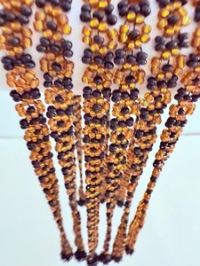 Hecho a mano con cuentas de vidrio negro ámbar bronce tejido floral pulsera servilletero lazos - Imagen 1 de 12