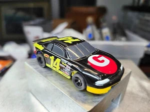 AFX #14 "G" STOCKER ON HARDEN CREEK SUPER 7-SC CHASSIS HO SLOT CAR - Picture 1 of 3