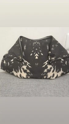  Bolso Alexander McQueen DE MANTA Cluth Blanco y Negro Estampado Leopardo  Foto 1 de 4
