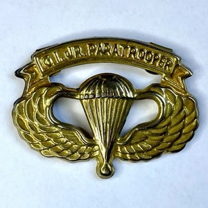 Distintivo spilla paracadutista GI Jr vintage militare USA junior latta pressata oro - Foto 1 di 7