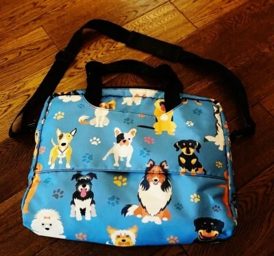 Estuche de transporte para regazo azul con diseños de perrito nuevo sin etiquetas Foto 1 de 3