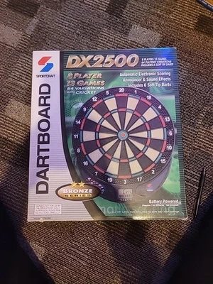 Tablero de dardos electrónico Sportcraft GX-2700 con caja de dardos - caja abierta Foto 1 de 2