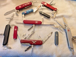 LOT OF 10 VICTORINOX SWISS ARMY KNIVES -DELAMONT, CLASSIC, MISC. - SOME RARE - Picture 1 of 18