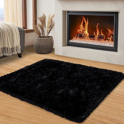 Alfombra pequeña negra peluda 2x3 alfombra antideslizante de felpa suave para dormitorio y guardería Foto 1 de 4