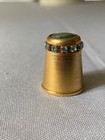 Collectible brass thimble set with stones
