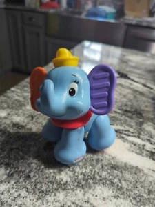 Juguete plástico para bebé DUMBO Fisher Price elefante Disney clicker amigos 2012 niño pequeño - Imagen 1 de 7