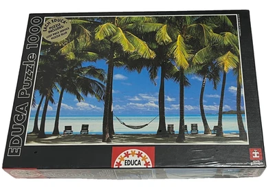 Quebra-cabeça EDUCA 1000 peças Peter Adams "The Hammock" palmeiras praia oceano lacrado - Imagem 1 de 3