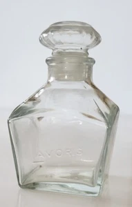 Enjuague bucal Lavoris de vidrio transparente vintage botella cuadrada vacía y tapón boticario - Imagen 1 de 8