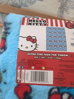 Manta Hello Kitty Ultra Fina Imitación Piel 50x70" Azul Arco Iris Manzana Abejas Sol Foto 1 de 3