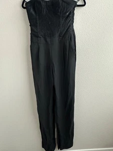 Neu ohne Etikett Bebe Größe 0 schwarzer Overall weites Bein Spitze Korsett Oberteil trägerlos gefütterte Cups - Bild 1 von 12