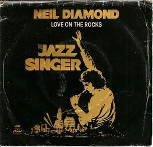 THE JAZZ SINGER - NEIL DIAMOND - LOVE ON THE ROCKS / ACAPULCO - CANADA - 7"-1980 - Picture 1 of 2