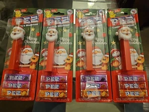 4 Stück 2023 PEZ SANTA Süßigkeitenspender Frohe Weihnachten - Bild 1 von 2