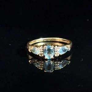 3 Stone Light Blue Lady's Gold Ring 10K Yellow Gold 1.8g Size 7 (GO1062855) - Picture 1 of 5