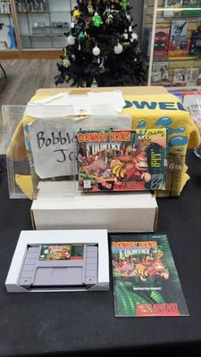 CIB DONKEY KONG COUNTRY SUPER NINTENDO SNES VIDEO GAME COMPLETE IN BOX PROTECTOR - Image 1 of 4