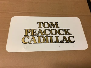 Tom Peacock Cadillac Houston Texas concesionario refuerzo matrícula - Imagen 1 de 2