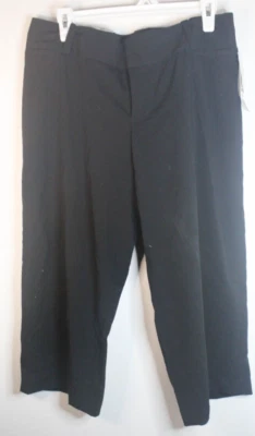 Pantalones negros Mossimo para mujer tiro bajo calce moderno talla 10 ajustados hasta la cadera/muslo Foto 1 de 4