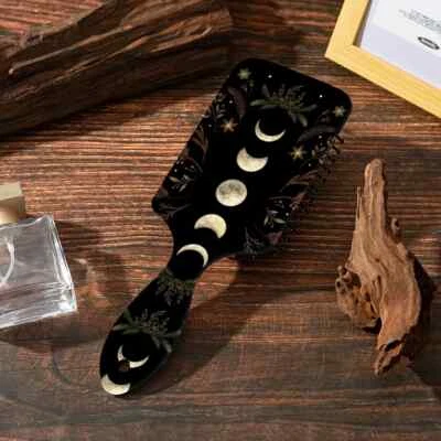 Cepillo de pelo con paleta grande cojín de aire duradero ABS mango de plástico negro fases lunares Foto 1 de 4