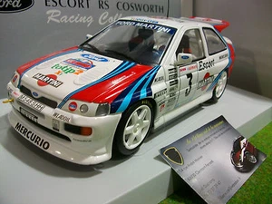 FORD ESCORT RS COSWORTH MARTINI 1000 RALLYE 1995 au 1/18 UT Models 39550 voiture - Picture 1 of 4