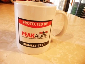COFFEE MUG PEAK ALARM ADVERTISING - Picture 1 of 2
