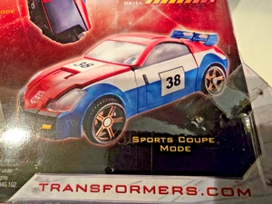 NEW SEALED Transformers Universe Deluxe Class Smokescreen Nissan 350Z EXCELLENT - Picture 1 of 9