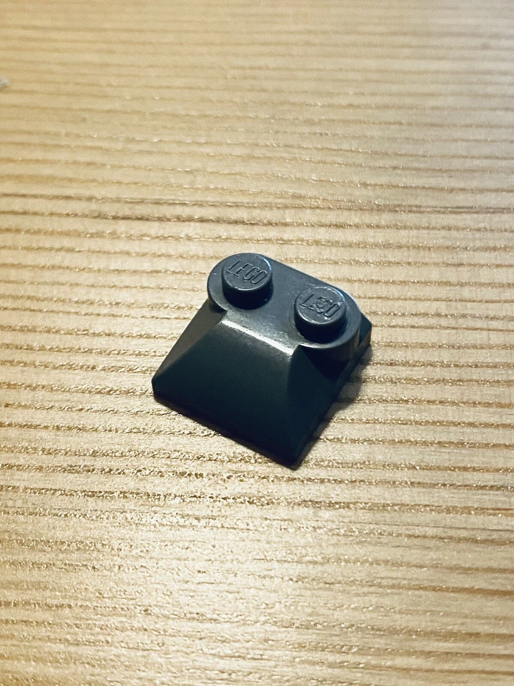 LEGO 47457  - Slope, Curved 2x2x2/3 With 2 Studs And Curved Sides - Dark Grey x1 - Image 1 of 1