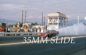 DIAPOSITIVA NHRA 35 MM - JIM LIBERMAN JUNGLE JIM ROJO DIVERTIDO COCHE BURNOUT POMONA #GV23 - Imagen 1 de 1