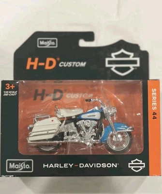 Motocicleta diecast Electra Glide Harley Davidson serie 44 1/18 1966 66 FLH Foto 1 de 4